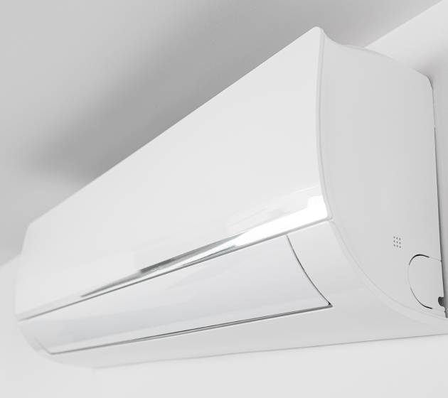 Indoor Air conditioner unit mounted on wall used for heating or cooling a space. Domestic system